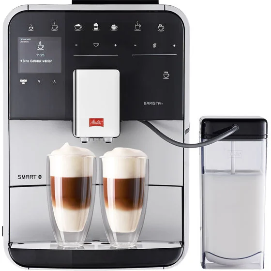 Melitta Barista T Smart — srebrny ekspres, widok z przodu; pojemnik na mleko na zdjęciu jest wyposażeniem dodatkowym